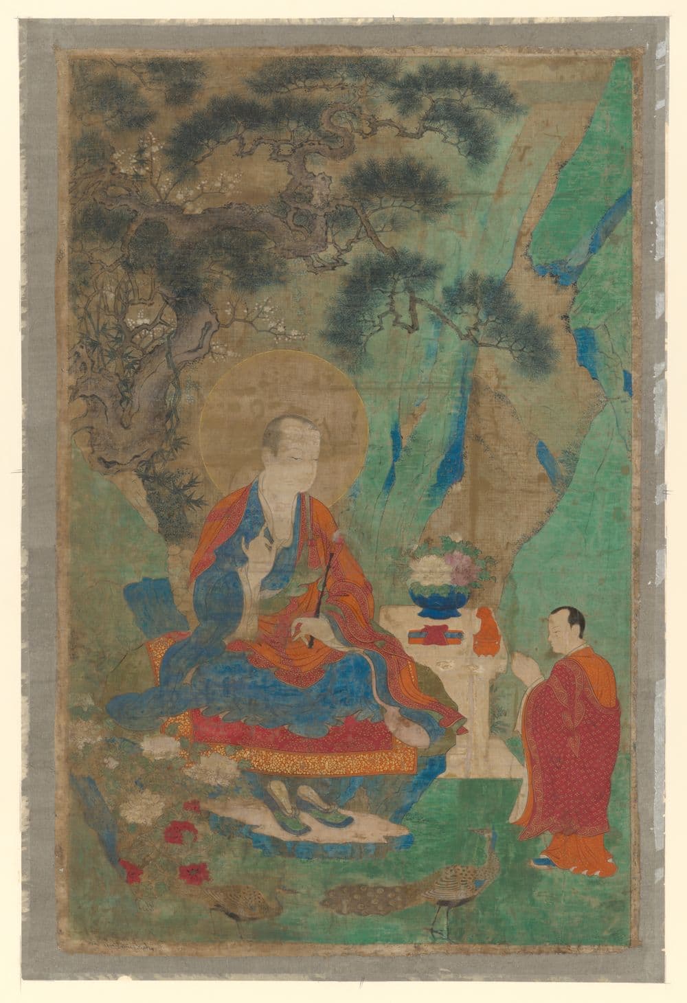 Thangka painting of the Arhat Vajraputra seated in a green landscape beneath pine trees, with an attendant
